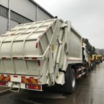 Guyana’s Waste Management Gets a Boost with Delivery of High-Performance Garbage Compactor Trucks FOTON Rear Loader Refuse Garbage Truck Back