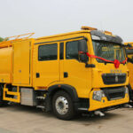 A Line of Sweeper Trucks to HongKong