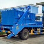 Philippines' Cebu City Tackles Overflow: Urgent Delivery of 10 Skip Loader Garbage Trucks to Manage Tourist Surge FAW 12CBM Skip Loader Garbage Truck Back