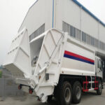 Ghana Invests in Efficiency: Accra Receives 8 Advanced Compactor Garbage Trucks for High-Density Routes ISUZU F-Series Waste Compactor Truck Back