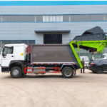 How Does a Compactor Garbage Truck Manage Waste Compression? SINOTRUK 12CBM Rear Loader Garbage Truck Working