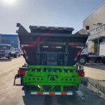 Self-Tipping Garbage Trucks: Reducing Manual Labor in Waste Management ISUZU 6CBM Self Loading Garbage Dump Truck Back