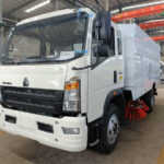Airport Sweeper Trucks Ensure Runway Safety in Qatar SINOTRUK 5CBM Street Sweeper Truck