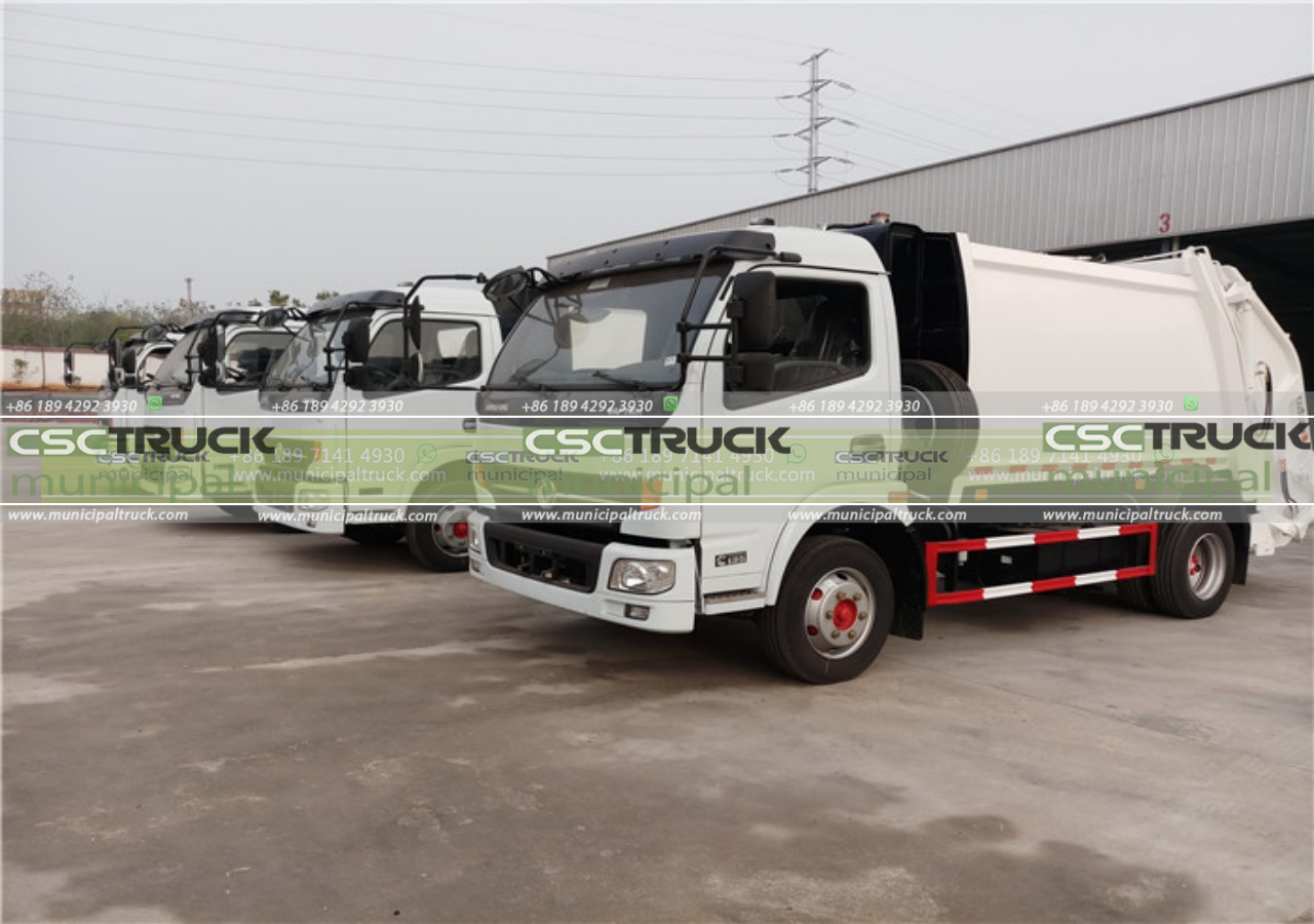 compactor garbage truck side