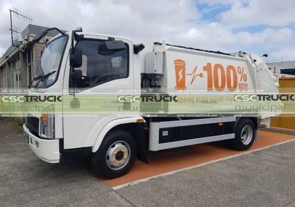 white rear loader compactor garbage truck