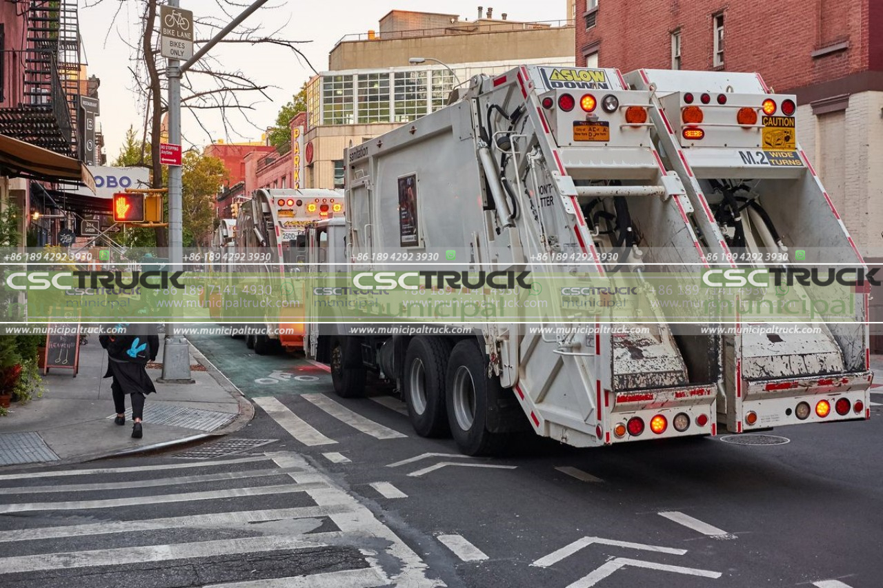 road with garbage trucks