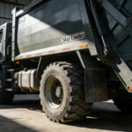 Why Choose a Skip Loader Garbage Truck for Urban Waste
